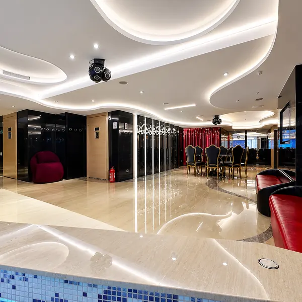 Bright pool bathing area with lounge seating