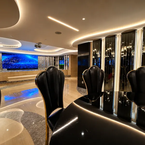 High-back seating beside the pool windows