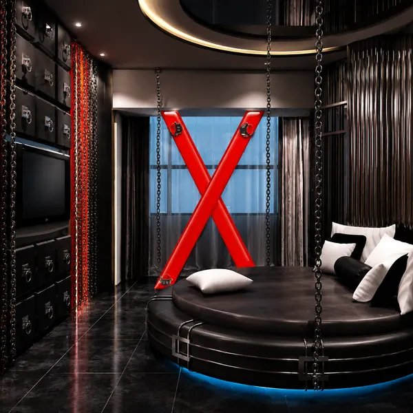 Red-and-black themed room with stage lighting