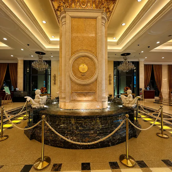 Grand Emperor hotel lobby with a classic central column
