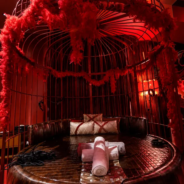 Red birdcage round-bed room