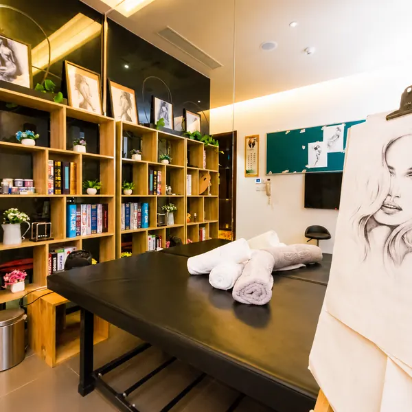 Gallery-style room with figure wall art
