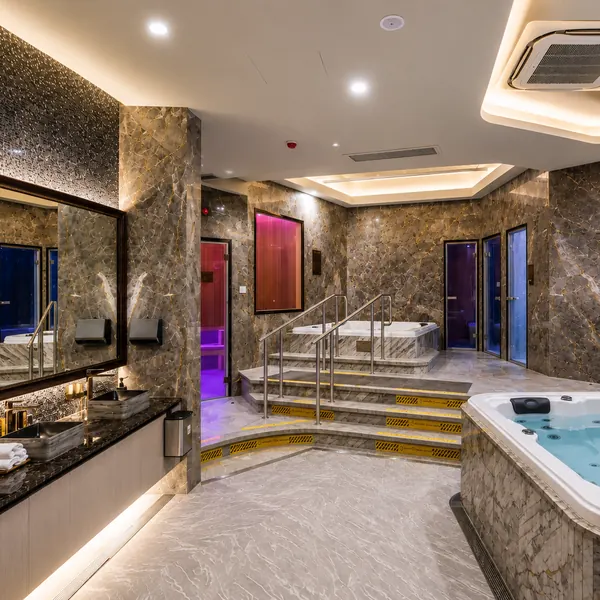 Jacuzzi and vanity area in the bathing zone