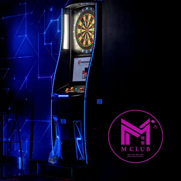 Darts machine in a neon game corner