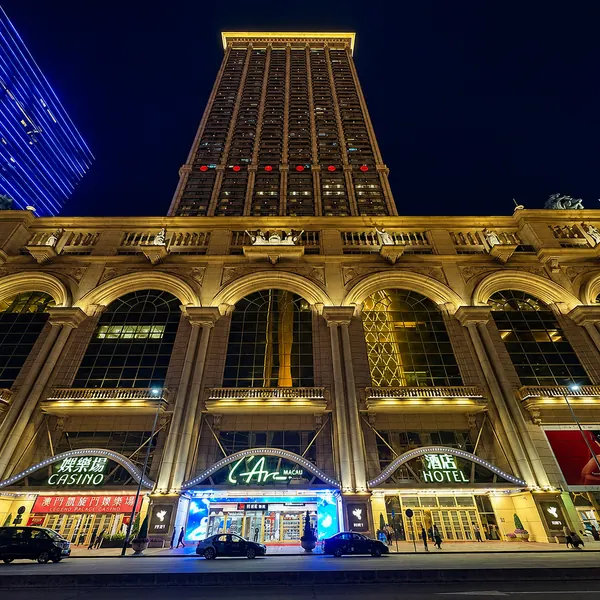 Hotel entrance with illuminated night signage